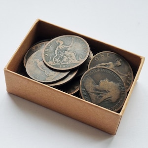 25 viktorianska encents i presentask