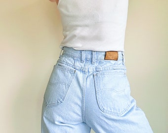 vintage Lee light wash denim jeans | high rise mom jeans | baggy leg | 80’s/90’s jeans | waist 14” 15”inches | tapered leg