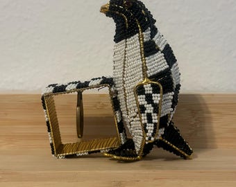 Servilletero con forma de pingüino de Mackenzie Childs