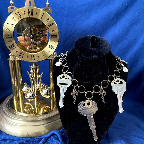 Dr. Who themed "Keys to the Tardis" necklace and earrings set.