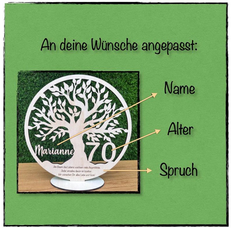 May include: A personalized wooden tree of life decoration. The design features a tree silhouette with the name "Marianne" and the number "70". The text "An deine W&uuml;nsche angepasst" is at the top. The decoration is on a green background.