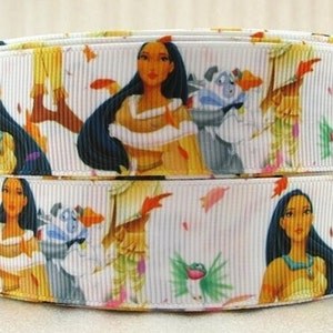 May include: White satin ribbon with a repeating pattern of a cartoon Native American woman with long black hair, a brown animal, and a green bird. The ribbon is 1.5 inches wide.