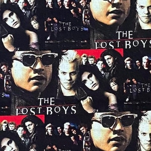 May include: A black and white collage featuring multiple images of the movie "The Lost Boys". The collage includes images of the main characters, including a vampire, a werewolf, and a group of teenagers. The title "The Lost Boys" is repeated throughout the collage.