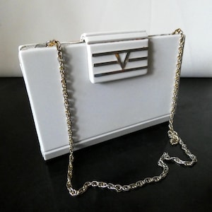 French Art Deco handbag cream colored phenolic and chrome modernist handbag. Celluloid coated and lined with fine genuine leather. 1930&#39;s