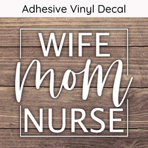 May include: White vinyl decal with the text "WIFE MOM NURSE" on a woodgrain background.