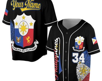 May include: Black baseball jersey with a Philippine flag design. The jersey has a white collar and sleeves, and features the Philippine coat of arms on the front. The back of the jersey has the text "Philippines" and the number "34" in white.