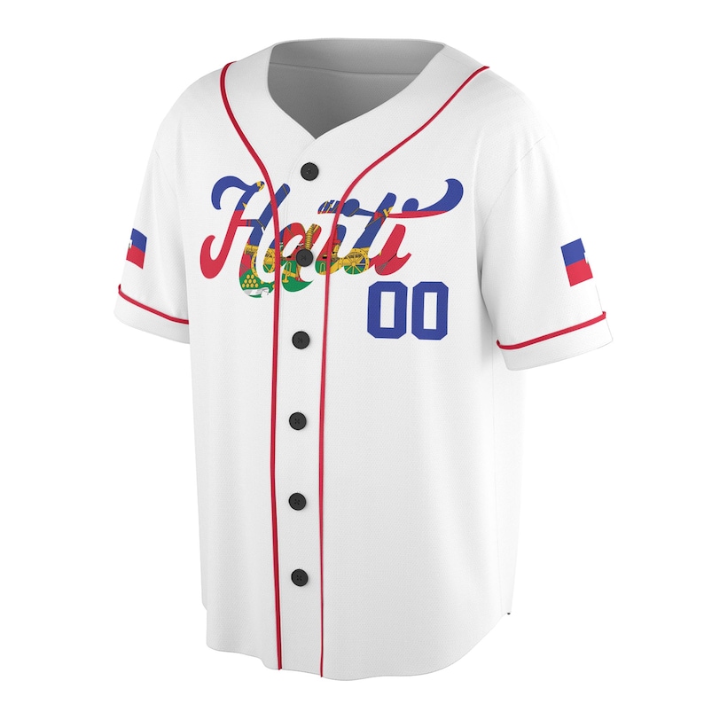 May include: White baseball jersey with red trim and a blue number "00" on the front. The word "Haiti" is written in a stylized font across the chest, with the Haitian flag colors incorporated into the lettering.