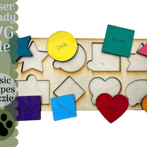 May include: A wooden puzzle with cutouts of basic shapes, including a circle, square, triangle, star, diamond, heart, oval, and rectangle. Each shape is labeled with its name. The puzzle pieces are colored in various bright colors.