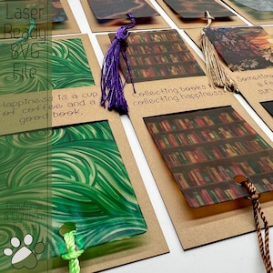 May include: A set of laser-cut bookmarks with different designs and quotes. The bookmarks are made of clear acrylic and have a variety of colors and patterns. The quotes on the bookmarks include "Happiness is a cup of coffee and a good book" and "Collecting books is collecting happiness."