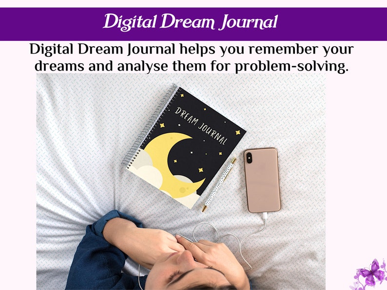 May include: A black and yellow notebook with the words "DREAM JOURNAL" on the cover. The notebook is lying on a white bedspread with a gold pen and a pink smartphone next to it. A person is lying on the bed with their head covered by a blue shirt.