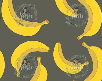 May include: A seamless pattern featuring yellow bananas on a dark gray background. The bananas are arranged in a repeating pattern, with some bananas overlapping each other. The text "Susie Makes It All" is repeated throughout the pattern.