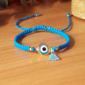 Blue Evil Eye Macrame Bracelet: Greek mati, Gold-Plated Charm with Silk Tassel