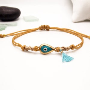 Evil Eye Armband: Greek mati bracelet, Gold Teardrop Charm, Boho Tassel, Adjustable Cord