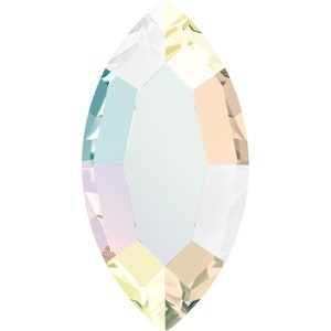 May include: A clear iridescent marquise-shaped crystal with a rainbow effect.