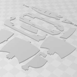 May include: A paper model kit of a Viking ship, with pieces labelled and ready to be cut out and assembled. The kit includes a detailed instruction sheet and is approximately 50 cm long when assembled.