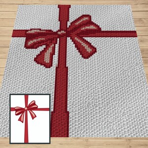 May include: A white crocheted blanket with a red ribbon and bow. The blanket is made with a textured stitch and has a simple design.
