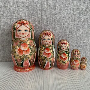 Beautiful nesting dolls Russian girls with spring flowers signed matryoshka Beautiful nesting dolls Russian girls with spring flowers signed matryoshka