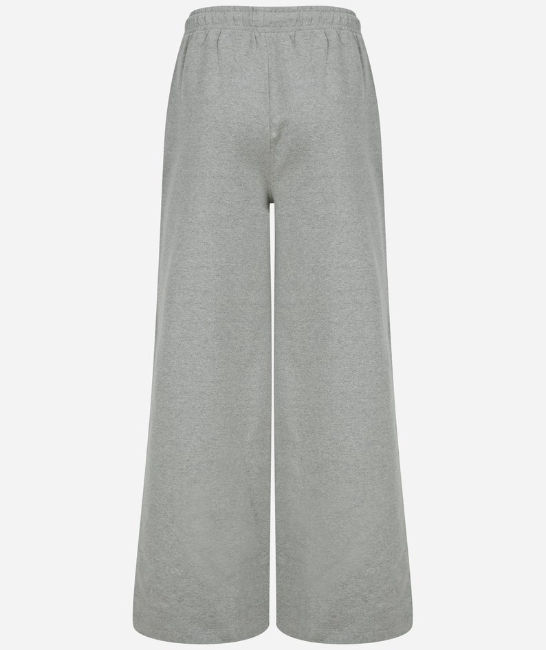 May include: Grey wide-leg sweatpants with an elastic waistband.