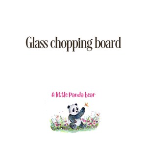 May include: A white background with the text "Glass chopping board" in a brown font. Below the text is a watercolor illustration of a panda bear sitting in a field of flowers, with the text "A little Panda bear" in a pink font.