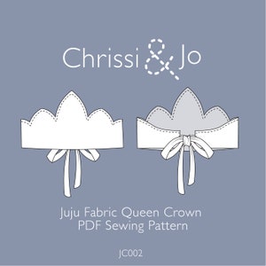 May include: A white fabric queen crown sewing pattern with a bow on the back. The pattern is called "Juju Fabric Queen Crown PDF Sewing Pattern" and the pattern number is "JC002".
