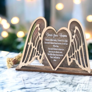 May include: Wooden heart-shaped sign with wings, featuring the text "Dimes from Heaven" and a poem about finding a dime as a sign from a loved one in heaven.