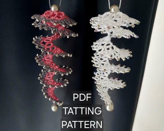 May include: Two spiral-shaped tatting ornaments hang vertically. One is red and dark gray, the other is white. Both feature small beads along the edges and a single pearl-like bead at the top and bottom. Text reads: PDF TATTING PATTERN.