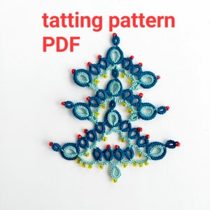 May include: A blue and green tatting pattern in the shape of a Christmas tree with red beads. The pattern is labeled "tatting pattern PDF".