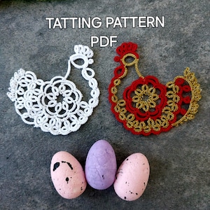 May include: Two crocheted chicken patterns in red and white with gold accents. The patterns are on a gray background with three speckled eggs.
