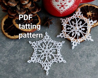 May include: Two white crocheted snowflakes on a gray surface. The text "PDF tatting pattern" is written in black on a brown background.