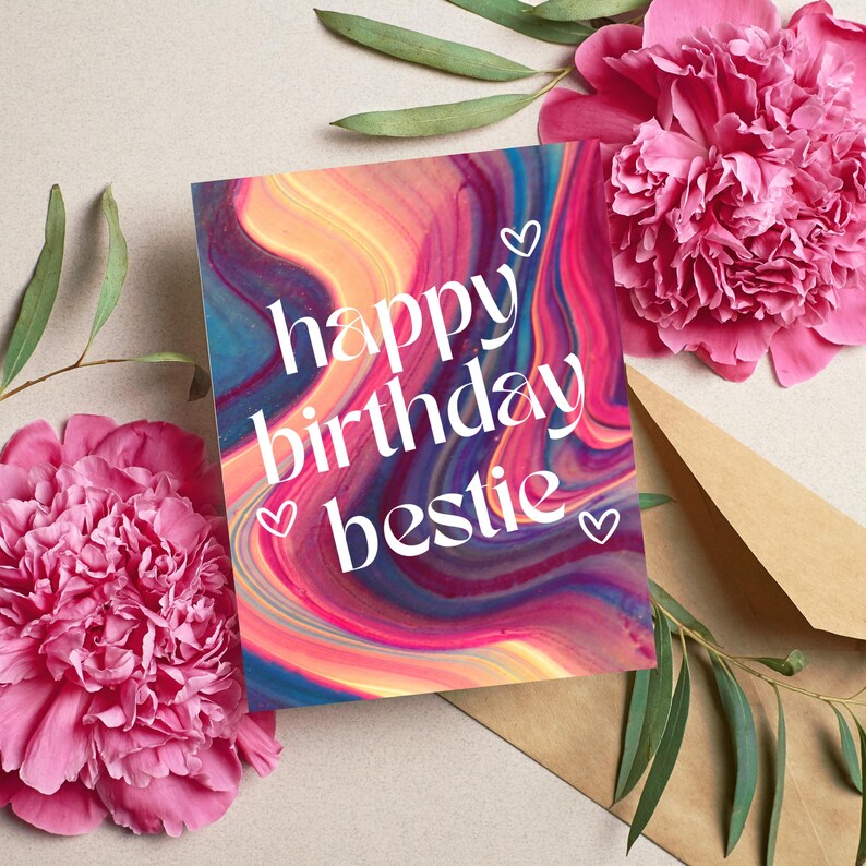 May include: A colorful birthday card with a swirling abstract background in shades of pink, blue, and yellow. The card says "happy birthday bestie" in white text with small hearts.