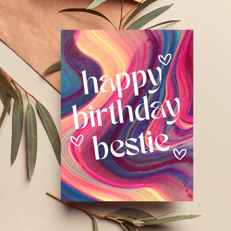 May include: A colorful card with a marbled background in shades of pink, blue, and purple. The text "happy birthday bestie" is written in white with small hearts around the text.