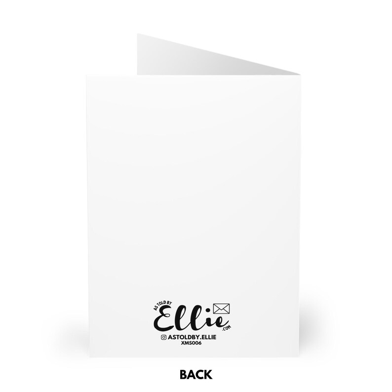 May include: White card with the text "As Told By Ellie" and a logo of a stylized envelope with the text "Ellie" in a black script font. The text "@ASTOLDBY_ELLIE.COM XM5006" is below the logo.