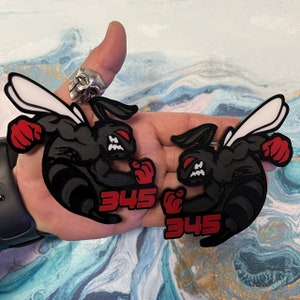 Fender Badges | Hornet BEE SWOLE Black Emblem Red Knuckles, Red Eye and Numbers |2 BADGES| Angry Aggressive Car Badge