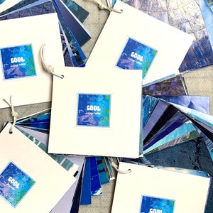 Magazine collage paper; Pre-sorted colors – Cool hues. Flip & Find® the perfect piece. National Geographic