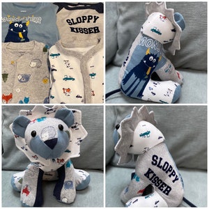 May include: Three handmade stuffed animal toys made from repurposed baby clothes. The toys are a lion, a monster, and a sloppy kisser. The lion is gray and blue with a white mane. The monster is blue and white with a black face. The sloppy kisser is blue and white with the words "Sloppy Kisser" on the front.