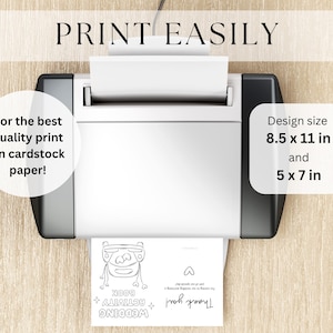 May include: A white printer printing a black and white wedding activity book. The design size is 21.6 x 27.9 cm and 12.7 x 17.8 cm. Text on the image says "PRINT EASILY" and "For the best quality print on cardstock paper!"