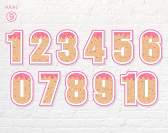 May include: Ten pink and white donut-shaped numbers with pink frosting and colorful sprinkles. The numbers are 1 through 10.