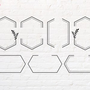 May include: Set of nine black hexagonal frames with two frames featuring simple leaf designs. The frames are on a white brick background.