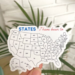 May include: A white sticker with a black outline of the United States map. Each state is labeled with its abbreviation. The text "STATES I have been to" is written in red and blue at the top of the sticker.