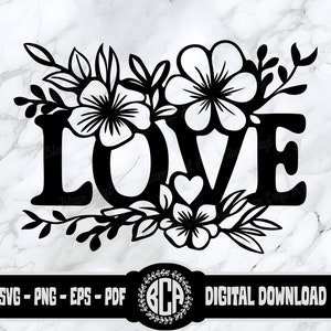 May include: Black and white silhouette of the word "LOVE" with floral embellishments. The word is in a bold, stylized font. The flowers are simple and delicate, with a heart shape in the center of the word.