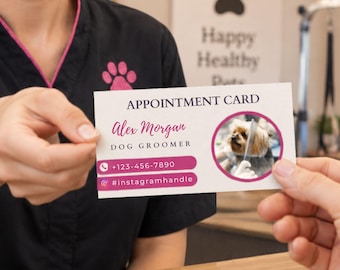 May include: A white rectangular appointment card for a dog groomer named Alex Morgan. The card features the text APPOINTMENT CARD, a circular photo of a dog, a phone icon with +123-456-7890, and an Instagram icon with #instagramhandle.