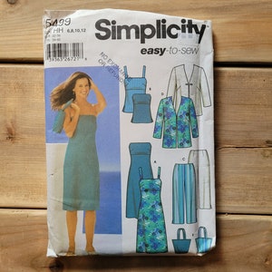 May include: Simplicity sewing pattern number 5499, easy-to-sew, for sizes 6, 8, 10, and 12. The pattern includes instructions for making a sleeveless top, a dress with straps, a jacket, trousers, and a tote bag. The pattern is shown on a white background with a model wearing the dress.