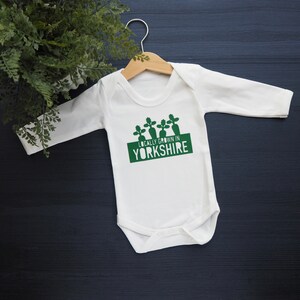 Locally grown baby outfit personalised with new baby’s own birth town, county or country. 

A custom baby onesie perfect for a homegrown newborn baby boy or baby girl.