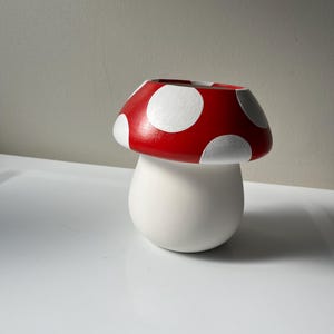 Hand-painted ceramic mushroom planter with drainage hole