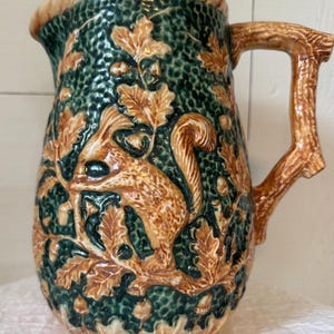 Vintage Majolica Pottery Pitcher Squirrel With Tree Branch Handle