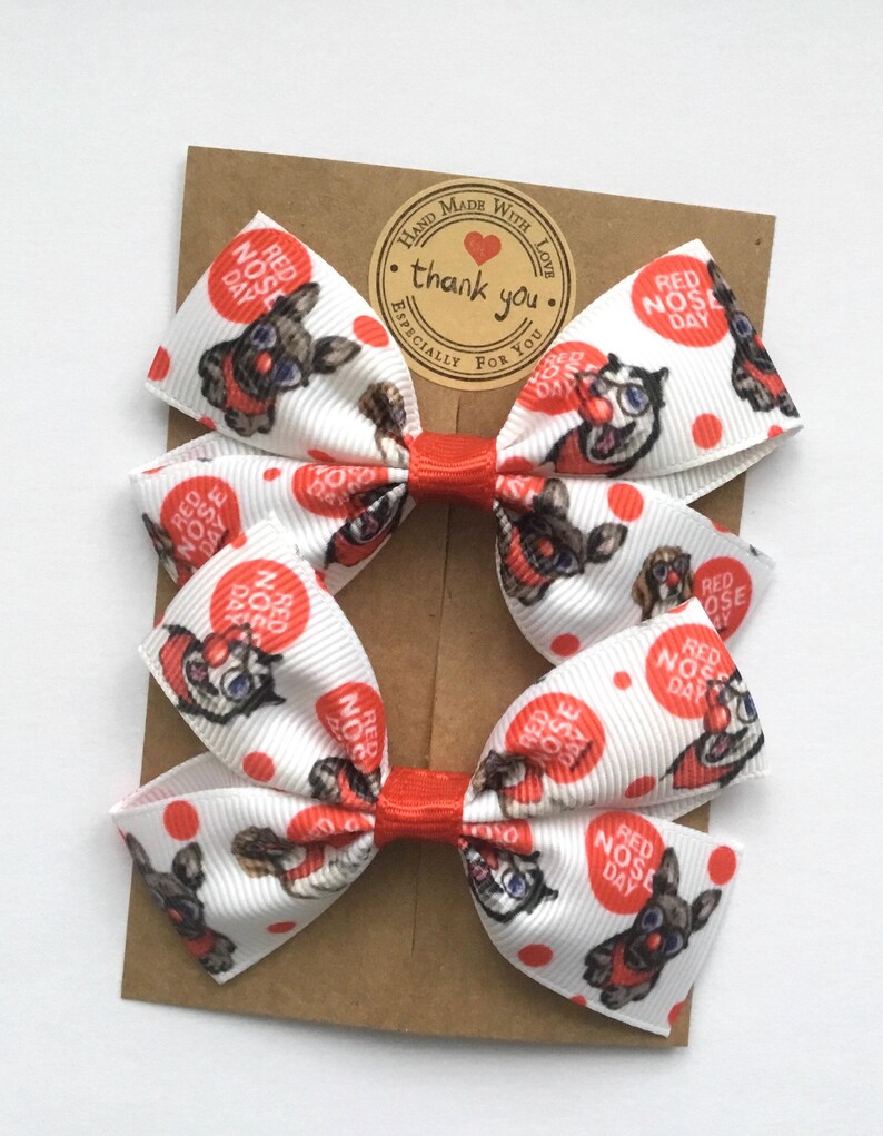 Funny faces Red Nose Day hair accessories, set of two 3-inch bows for school charity day, handmade in the UK.