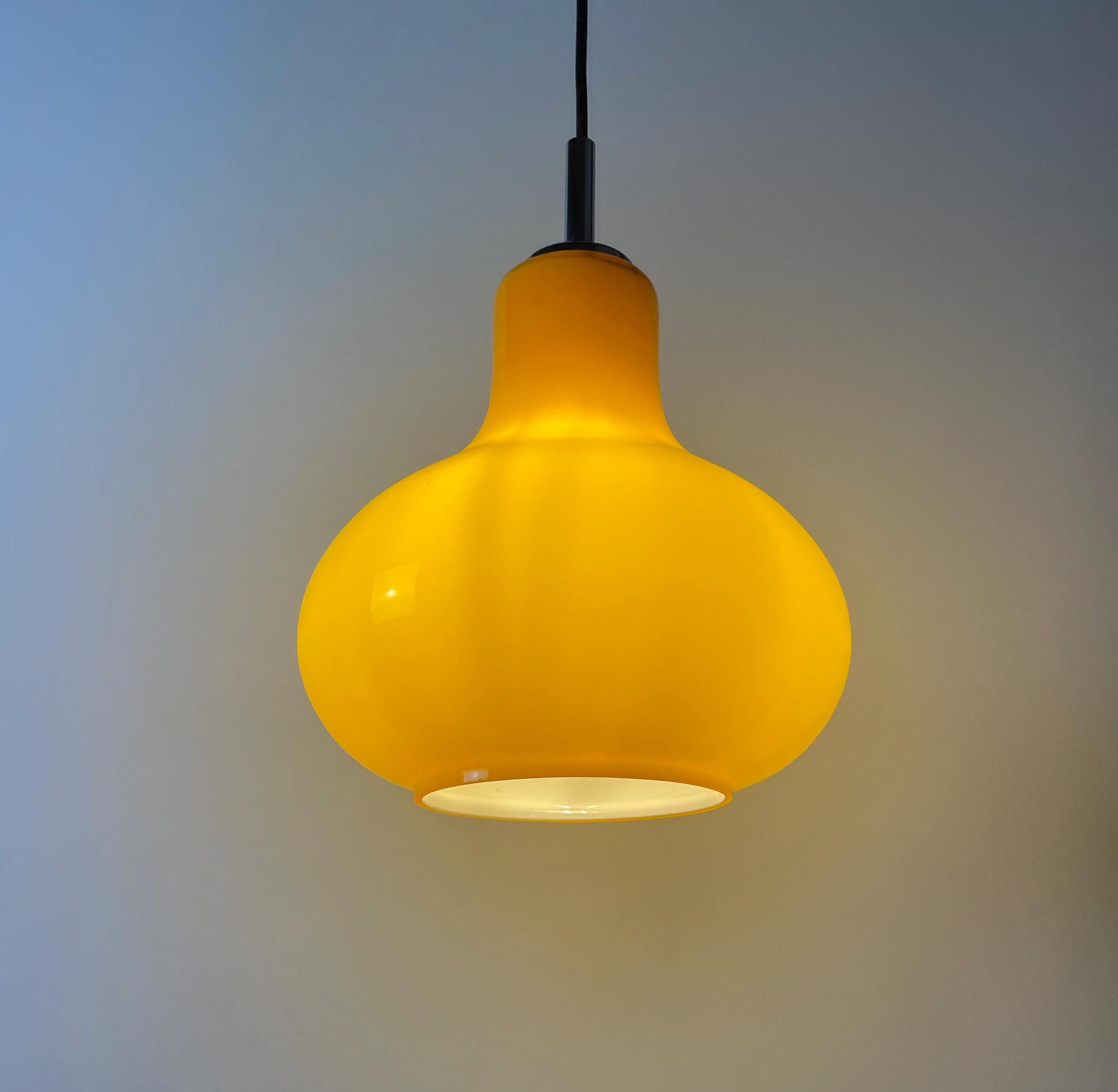 Yellow droplet shaped pendant light by Peill & Putzler 1960