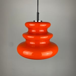 Bright orange glass pendant light by Peill and Putzler 1960