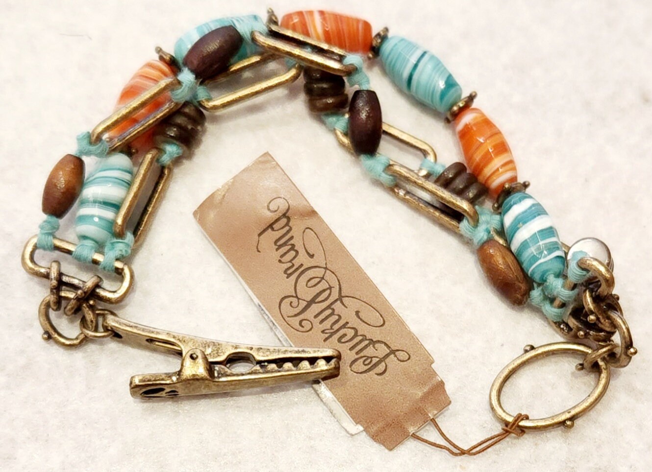 Swampy confetti bracelet helper (roach clip)
