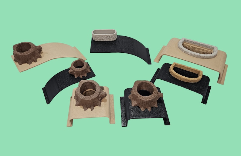 May include: Six different decorative planters, each with a unique design. The planters are made of a textured material and are displayed on a variety of bases, including wood and black plastic.